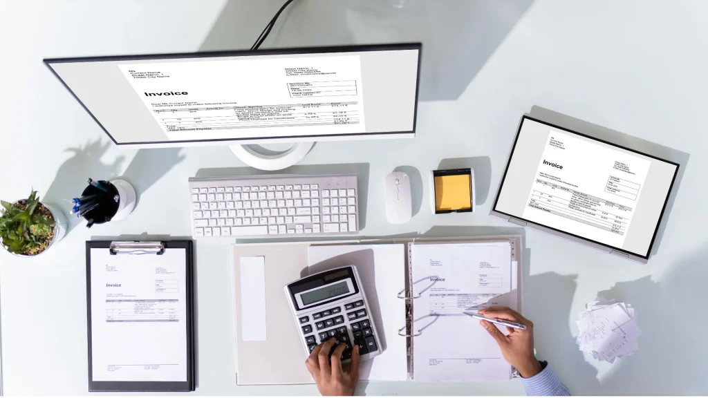 Zoho Books vs. QuickBooks: Which Accounting Software is best for Your Business in 2025? A small business owner surrounded by multiple tasks invoices calls charts calendar